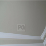 painting of wood trim and crown moulding details on ceiling