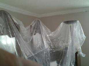 Furniture Covered With plastic before interior painting services from PG PAINT & DESIGN Ottawa House Painters