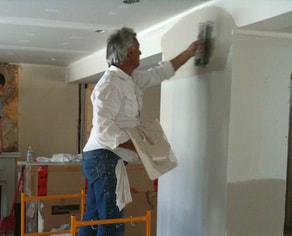 PGPAINT & DESIGN working on a Interior Renovation project with drywall patching and repair
