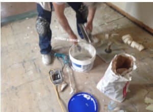 mixing drywall compound for repairs before painting