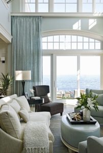 living room with big window and furniture painted in neutral gray paint and white gives modern look by Ottawa House Painters PG Paint & Design